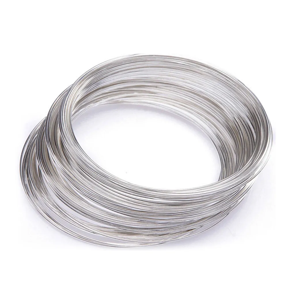 Close up of bright ASTM Grade 3 TA3 titanium wire showing uniform diameter and smooth finish on a spool