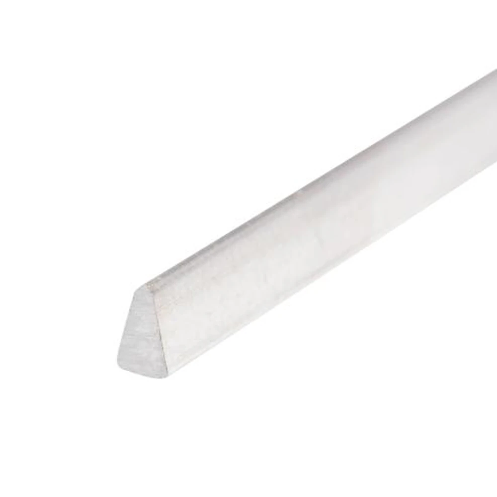 Close up of a single trapezoidal stainless steel profile wire showing its wedge shaped cross section