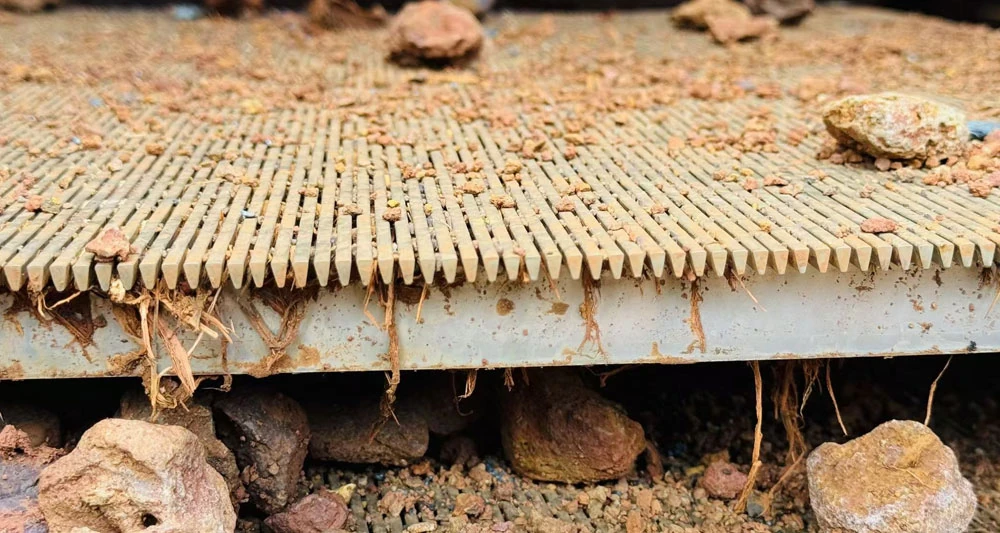 wedge wire screen panel installed in a mining screening application, separating ore particles while resisting clogging and heavy duty operating conditions.